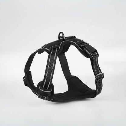 Black dog harness with reflective stripes on a white background