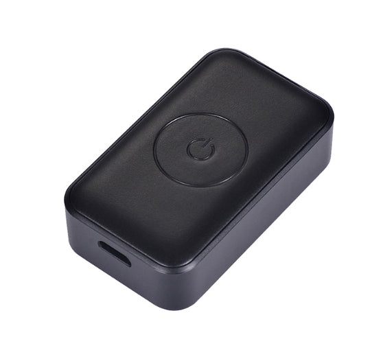 Black rectangular device with a circular logo on a white background