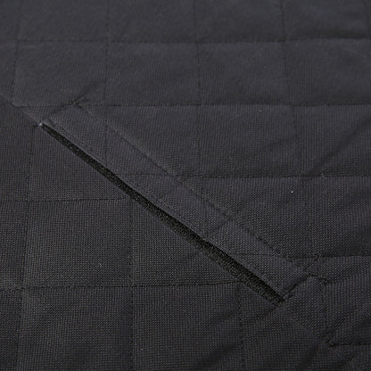 Close-up of black quilted fabric with stitching details