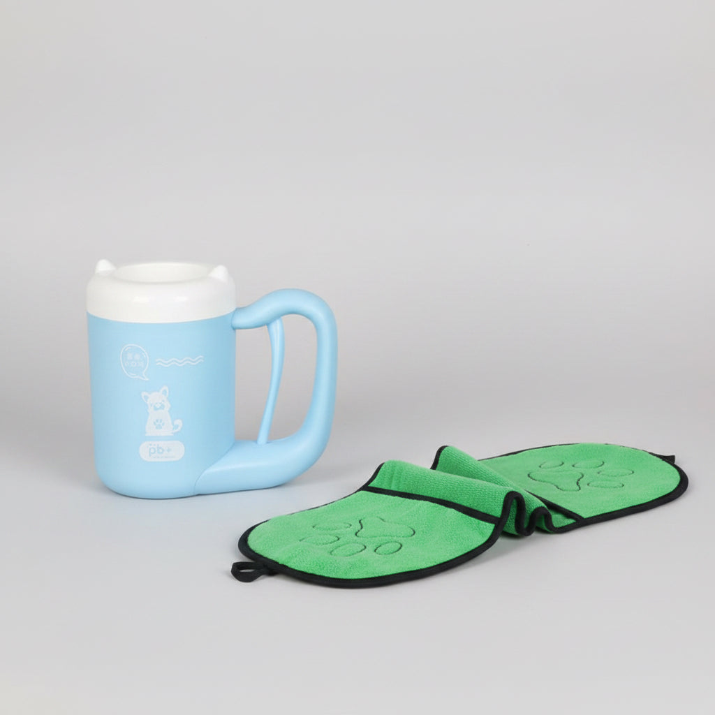Blue mug on a wooden shelf with a green butterfly-shaped pot holder featuring paw prints.