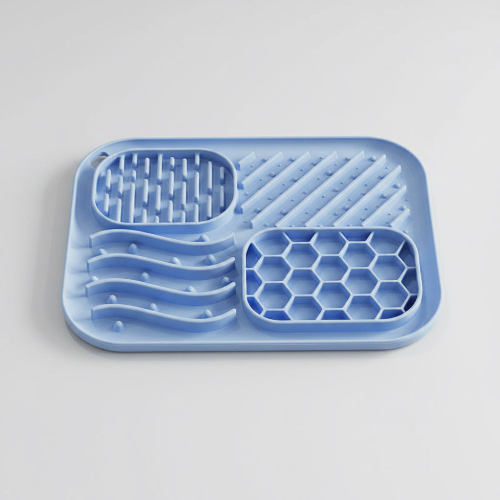 Blue silicone tray with textured sections on a white background