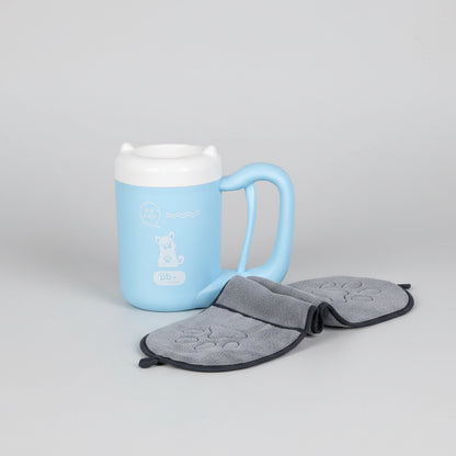 Blue mug on a wooden shelf with a gray bat-shaped on a white background