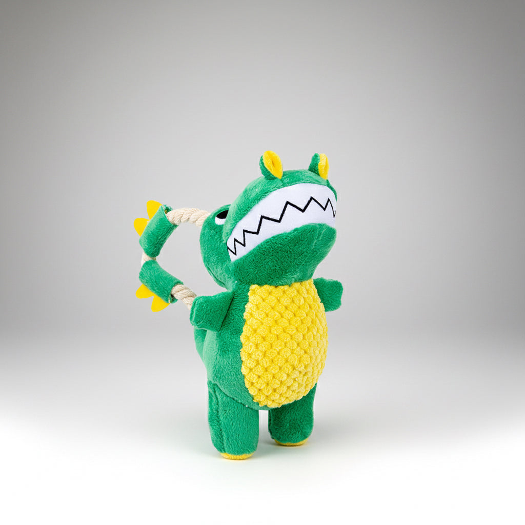 Green plush toy resembling a corn on a white background