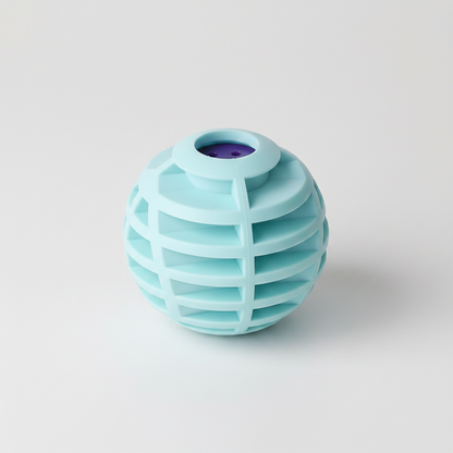 A light blue-green spherical silicone object with a ribbed cage-like pattern and a purple circular opening at the top, shown on a plain white background.