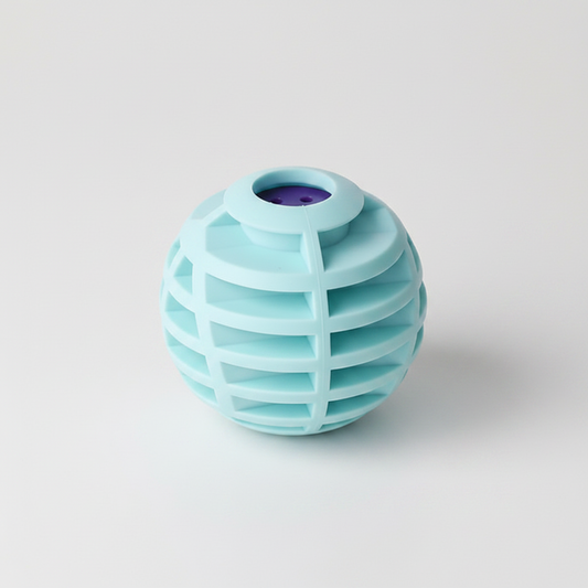 A light blue-green spherical silicone object with a ribbed cage-like pattern and a purple circular opening at the top, shown on a plain white background.