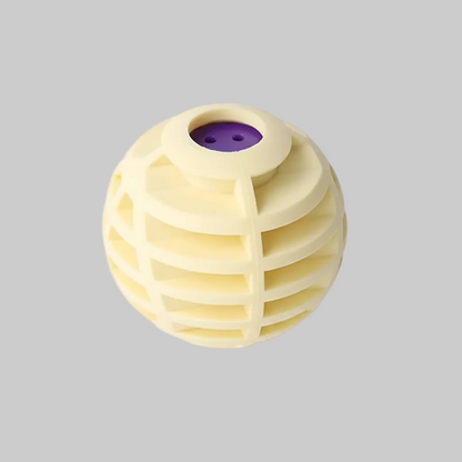 A spherical, cream-colored pet toy with a ribbed, honeycomb-like structure and a purple circular insert at the top, shown on a clean white background.