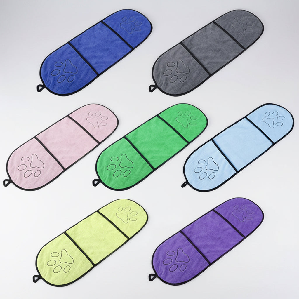 Set of colorful pet car seat covers with paw prints on a white background