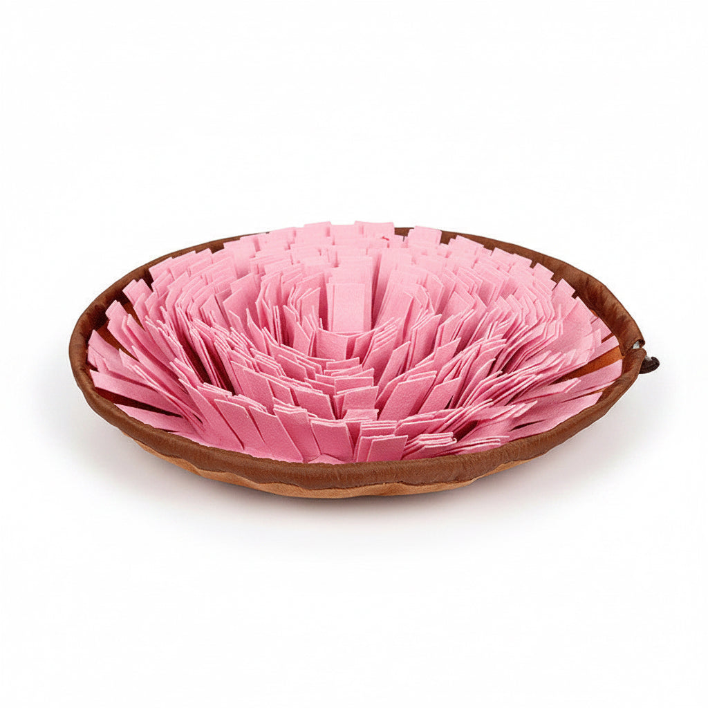 Pink pet food feeder with brown rim on a white background