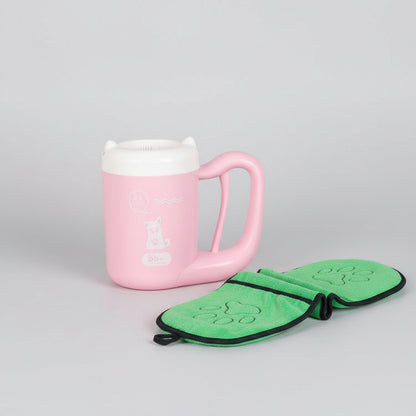 Pink mug  a green paw print towel
