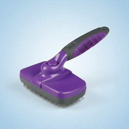 Purple pet grooming brush with black handle