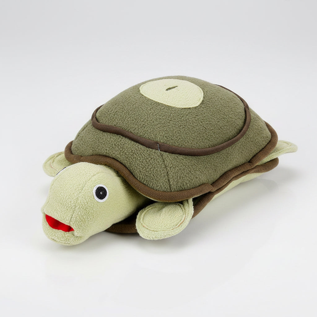 Plush turtle toy with a white background