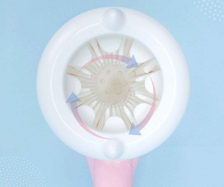 Close-up of a white and pink hairbrush on a light blue background